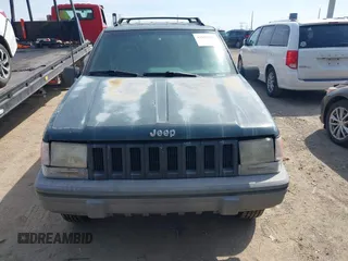 1994 Jeep Grand Cherokee Laredo with VIN 1J4GZ58S0RC266616, listed as a IAAI auction lot 41890812 with 190,000 mi miles. Bid and sale history available at carsss.com. Image 6.
