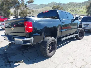 2014 Chevrolet Silverado 1500 LT with VIN 3GCPCREC5EG484876, listed as a IAAI auction lot 41867292 with 118,341 mi miles and . Bid and sale history available at DreamBid. Image 4.