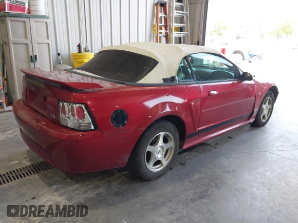 2003 Ford Mustang Deluxe z VIN 1FAFP44403F407592, wystawiony jako IAAI lot #42409746 z przebiegiem 211 269 mil mil oraz . Historia ofert i sprzedaży dostępna na DreamBid. Obrazek 4.