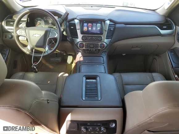2017 Chevrolet Suburban Premier with VIN 1GNSCJKC7HR128988, listed as a Copart auction lot 73958784 with 121,662 mi miles and Salvage Title. Bid and sale history available at carsss.com. Image 8.