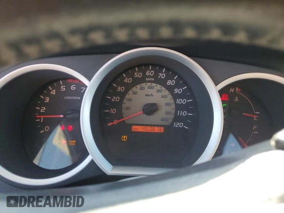 2010 Toyota Tacoma PreRunner with VIN 3TMKU4HN4AM025390, listed as a Copart auction lot 50242825 with 450,676 mi miles and Salvage title. Bid and sale history available at DreamBid. Image 9.