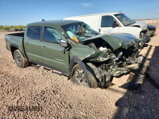 2021 Toyota Tacoma SR with VIN 3TMCZ5AN0MM437297, listed as a Copart auction lot 60737225 with Not provided miles and Salvage title. Bid and sale history available at DreamBid. Image 4.