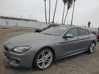 2014 BMW 6 Series 640i z VIN WBA6A0C50ED317434, wystawiony jako Copart lot #72963734 z przebiegiem 110 366 mil mil oraz Czysty tytuł • Clean title. Historia ofert i sprzedaży dostępna na DreamBid. Obrazek 1.