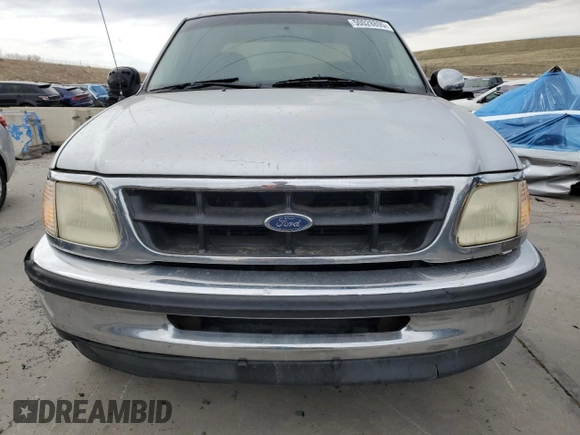 1998 Ford F-150 with VIN 2FTZX0729WCA50004, listed as a Copart auction lot 50028895 with 291,952 mi miles and Salvage title. Bid and sale history available at DreamBid. Image 5.