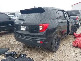 2021 Honda Passport Sport with VIN 5FNYF7H29MB000120, listed as a IAAI auction lot 41129219 with Not provided miles and . Bid and sale history available at DreamBid. Image 4.