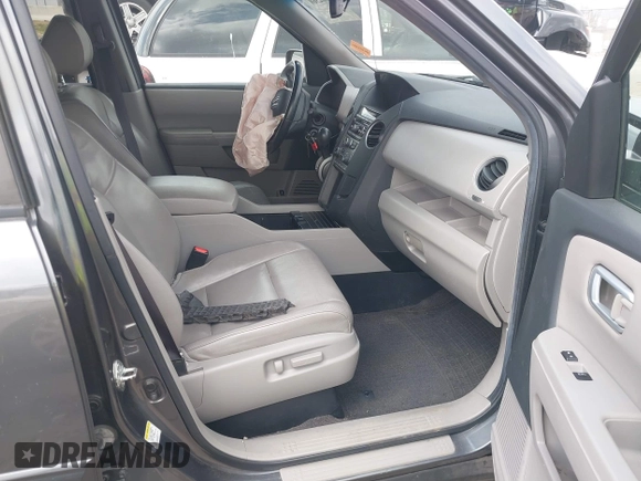 2012 Honda Pilot EX-L with VIN 5FNYF4H53CB026381, listed as a IAAI auction lot 41802360 with 165,425 mi miles and . Bid and sale history available at DreamBid. Image 5.