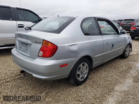 2005 Hyundai Accent GLS with VIN KMHCG35C75U354574, listed as a Copart auction lot 74931444 with 141,013 mi miles and Salvage Title. Bid and sale history available at carsss.com. Image 3.