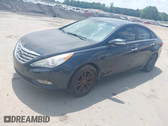 2013 Hyundai Sonata Limited with VIN 5NPEC4AB1DH636469, listed as a IAAI auction lot 42183823 with 186,219 mi miles and . Bid and sale history available at DreamBid. Image 2.
