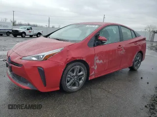 2019 Toyota Prius L Eco z VIN JTDKARFU9K3081764, wystawiony jako Copart lot #49454215 z przebiegiem 72 727 mil mil oraz Szkoda całkowita • Salvage title. Historia ofert i sprzedaży dostępna na DreamBid. Obrazek 1.