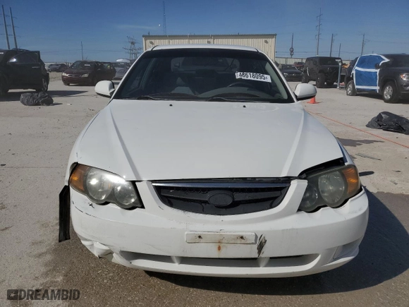 2002 Kia Spectra GS with VIN KNAFB161725077686, listed as a Copart auction lot 48618095 with 99,702 mi miles and Salvage Title. Bid and sale history available at carsss.com. Image 5.