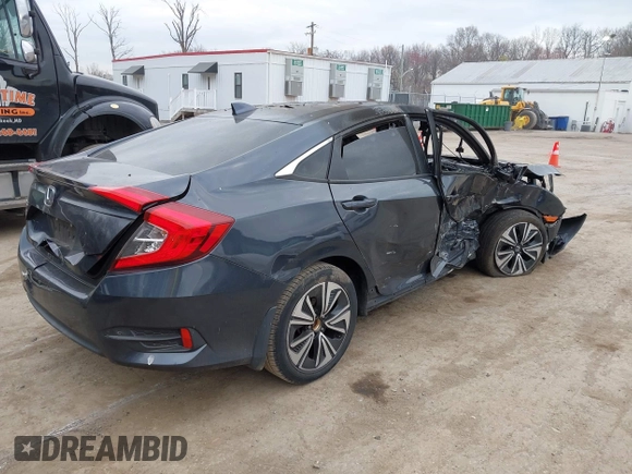 2016 Honda Civic EX-L z VIN 19XFC1F73GE033247, wystawiony jako IAAI lot #41910941 z przebiegiem Nie podano mil oraz . Historia ofert i sprzedaży dostępna na DreamBid. Obrazek 4.
