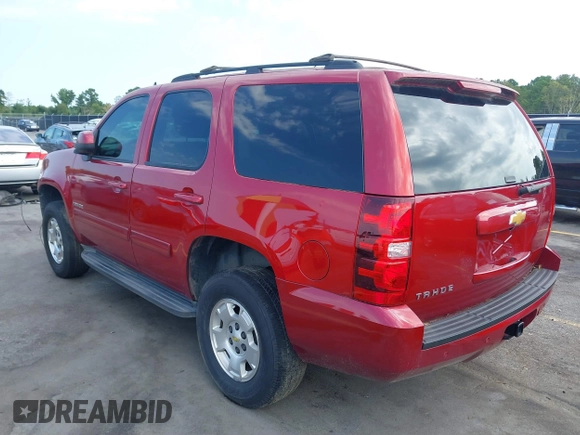 2013 Chevrolet Tahoe LS with VIN 1GNSCAE00DR359498, listed as a IAAI auction lot 40125477 with 156,100 mi miles and . Bid and sale history available at DreamBid. Image 3.