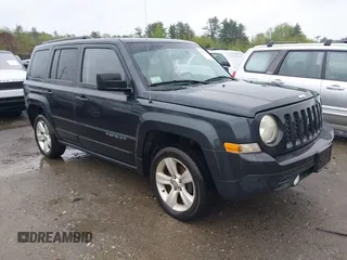 2014 Jeep Patriot Latitude with VIN 1C4NJRFB6ED689459, listed as a IAAI auction lot 42197469 with 202,899 mi miles. Bid and sale history available at carsss.com. Image 1.