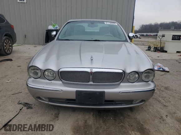 2004 Jaguar XJ with VIN SAJEA74C64SG08121, listed as a Copart auction lot 81736984 with 100,144 mi miles and Non Repairable. Bid and sale history available at DreamBid. Image 5.
