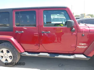 2012 Jeep Wrangler Unlimited Sahara with VIN 1C4BJWEG2CL209600, listed as a IAAI auction lot 42015290 with 133,229 mi miles and . Bid and sale history available at DreamBid. Image 13.