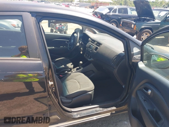 2013 Kia Rio EX with VIN KNADN4A32D6119638, listed as a IAAI auction lot 42313287 with 133,459 mi miles and . Bid and sale history available at DreamBid. Image 5.