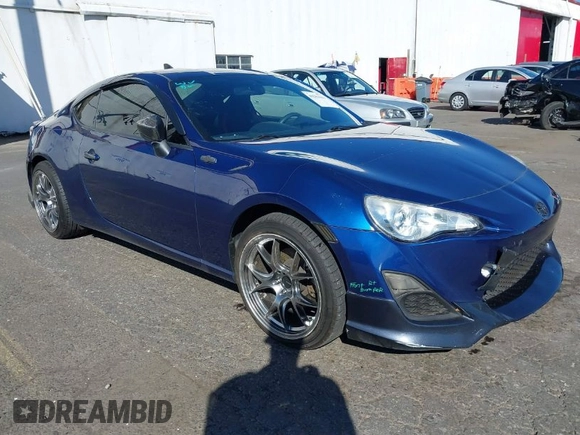 2013 Scion FR-S with VIN JF1ZNAA11D2702415, listed as a IAAI auction lot 40381041 with 63,581 mi miles. Bid and sale history available at carsss.com. Image 1.