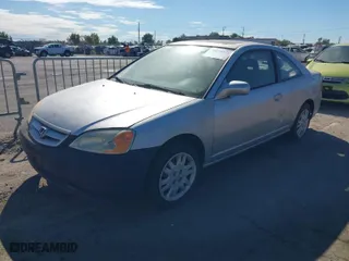 2003 Honda Civic EX with VIN 1HGEM229X3L072586, listed as a IAAI auction lot 40634772 with 202,134 mi miles. Bid and sale history available at carsss.com. Image 2.