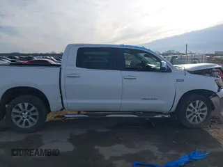 2012 Toyota Tundra 4WD Truck LTD with VIN 5TFHW5F15CX263868, listed as a IAAI auction lot 41669970 with 249,961 mi miles. Bid and sale history available at carsss.com. Image 13.