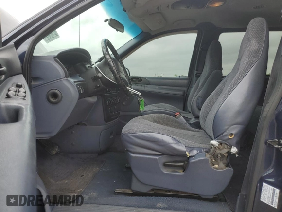 1998 Ford Windstar LX with VIN 2FMZA5146WBC36500, listed as a Copart auction lot 57662025 with 143,017 mi miles and Salvage title. Bid and sale history available at DreamBid. Image 7.