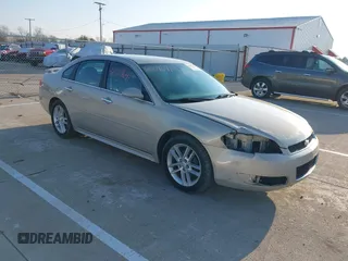 2012 Chevrolet Impala LTZ with VIN 2G1WC5E35C1311734, listed as a IAAI auction lot 42009641 with 151,875 mi miles and . Bid and sale history available at DreamBid. Image 1.