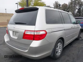 2007 Honda Odyssey EX-L with VIN 5FNRL38687B423865, listed as a IAAI auction lot 42190749 with 215,664 mi miles and . Bid and sale history available at DreamBid. Image 4.