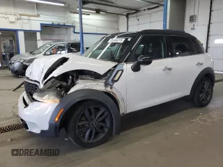2014 MINI Countryman S with VIN WMWZC3C52EWP52288, listed as a Copart auction lot 58346315 with 135,855 mi miles and Salvage title. Bid and sale history available at DreamBid. Image 1.