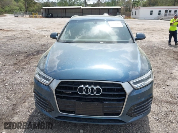2018 Audi Q3 Premium Plus z VIN WA1JCCFS8JR014631, wystawiony jako IAAI lot #41958696 z przebiegiem 94 063 mil mil oraz . Historia ofert i sprzedaży dostępna na DreamBid. Obrazek 12.