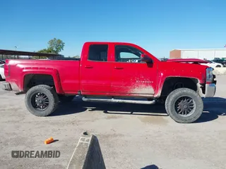2018 Chevrolet Silverado 1500 LT with VIN 1GCVKREC3JZ341056, listed as a IAAI auction lot 40851316 with 118,108 mi miles and . Bid and sale history available at DreamBid. Image 13.