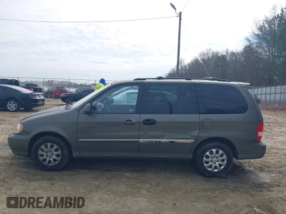 2004 Kia Sedona LX with VIN KNDUP131546543841, listed as a IAAI auction lot 41541012 with 112,122 mi miles. Bid and sale history available at carsss.com. Image 14.