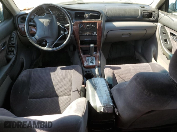2004 Subaru Legacy L with VIN 4S3BH625147306022, listed as a Copart auction lot 61554914 with 154,173 mi miles and Salvage title. Bid and sale history available at DreamBid. Image 8.