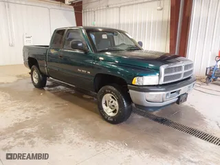 1999 Dodge Ram 1500 with VIN 3B7HF13Z8XM539989, listed as a IAAI auction lot 41711247 with 165,825 mi miles. Bid and sale history available at carsss.com. Image 1.
