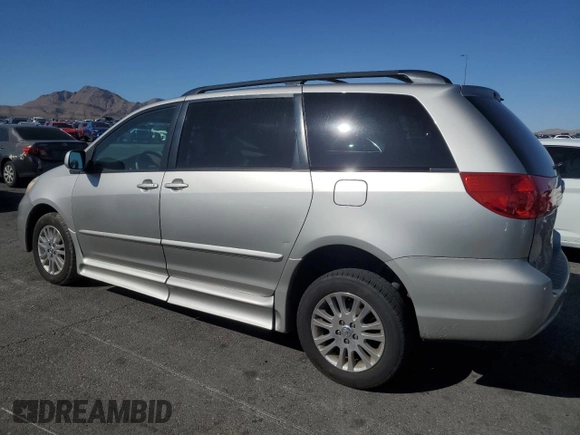 2010 Toyota Sienna XLE with VIN 5TDYK4CC3AS324570, listed as a Copart auction lot 60474005 with 259,128 mi miles and Salvage title. Bid and sale history available at DreamBid. Image 2.