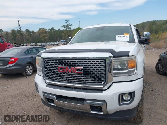 2016 GMC Sierra 2500HD Denali z VIN 1GT12UE82GF130096, wystawiony jako IAAI lot #41869448 z przebiegiem 129 659 mil mil oraz . Historia ofert i sprzedaży dostępna na DreamBid. Obrazek 12.