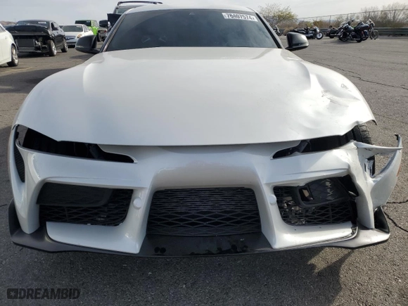 2023 Toyota GR Supra 3.0 with VIN WZ1DB0G00PW055929, listed as a Copart auction lot 76407574 with 16,889 mi miles and Salvage Title. Bid and sale history available at carsss.com. Image 5.
