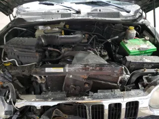 2004 Jeep Liberty Limited with VIN 1J4GL58K84W177787, listed as a Copart auction lot 88910535 with 143,779 mi miles and Salvage Title. Bid and sale history available at carsss.com. Image 12.