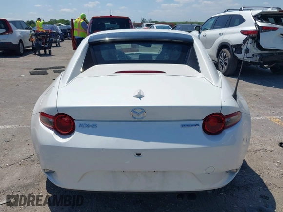 2021 Mazda MX-5 Miata Grand Touring z VIN JM1NDAM75M0450871, wystawiony jako IAAI lot #42060495 z przebiegiem 48 670 mil mil oraz . Historia ofert i sprzedaży dostępna na DreamBid. Obrazek 16.