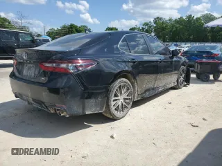2023 Toyota Camry SE with VIN 4T1G11AK2PU741315, listed as a Copart auction lot 51587555 with 91,043 mi miles and Salvage Title. Bid and sale history available at DreamBid. Image 3.