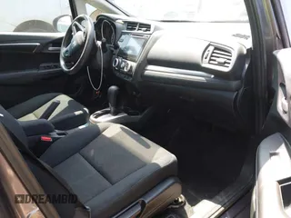 2015 Honda Fit EX-L with VIN 3HGGK5H84FM764084, listed as a IAAI auction lot 42321647 with 82,819 mi miles and . Bid and sale history available at DreamBid. Image 5.