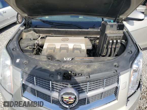 2010 Cadillac SRX Premium Collection с VIN 3GYFNCEY5AS630466, выставлен на аукционе Copart как лот 51288365 с пробегом 72 390 миль миль и Списание • Salvage title. История ставок и продаж доступна на DreamBid. Изображение 13.