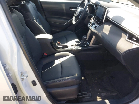 2022 Toyota Corolla Cross XLE with VIN 7MUEAAAG4NV027314, listed as a IAAI auction lot 42701907 with 30,275 mi miles and . Bid and sale history available at DreamBid. Image 5.