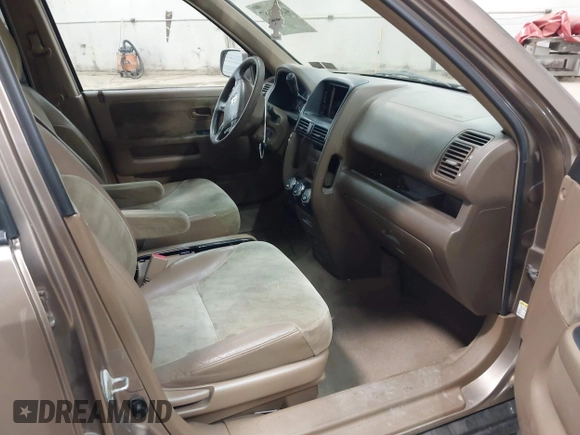 2004 Honda CR-V EX with VIN JHLRD78814C057877, listed as a IAAI auction lot 42065687 with 220,207 mi miles and . Bid and sale history available at carsss.com. Image 5.