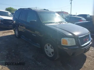 2002 GMC Envoy SLE with VIN 1GKDS13S522374940, listed as a IAAI auction lot 42622909 with 247,188 mi miles and . Bid and sale history available at DreamBid. Image 1.