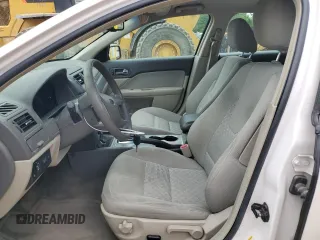 2010 Ford Fusion SE z VIN 3FAHP0HA0AR335424, wystawiony jako Copart lot #58853845 z przebiegiem 168 793 mil mil oraz Szkoda całkowita • Salvage title. Historia ofert i sprzedaży dostępna na DreamBid. Obrazek 7.