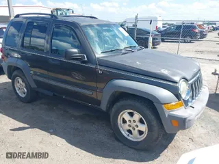 2005 Jeep Liberty Sport with VIN 1J4GL48545W655788, listed as a IAAI auction lot 41914703 with 166,899 mi miles. Bid and sale history available at carsss.com. Image 1.