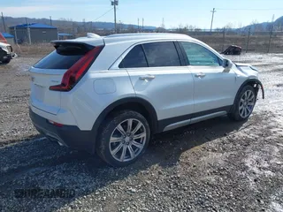 2020 Cadillac XT4 AWD Premium Luxury z VIN 1GYFZDR45LF016381, wystawiony jako IAAI lot #41556874 z przebiegiem 23 887 mil mil oraz . Historia ofert i sprzedaży dostępna na DreamBid. Obrazek 4.
