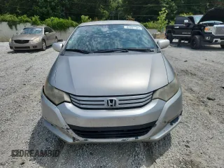 2011 Honda Insight LX z VIN JHMZE2H56BS009537, wystawiony jako Copart lot #62281105 z przebiegiem 240 131 mil mil oraz Szkoda całkowita • Salvage title. Historia ofert i sprzedaży dostępna na DreamBid. Obrazek 5.