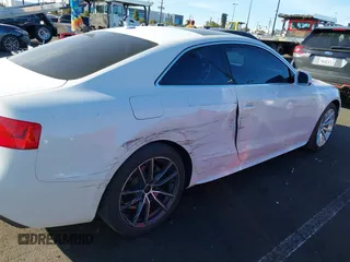 2016 Audi A5 Premium with VIN WAUD2AFR1GA007211, listed as a IAAI auction lot 41402123 with 64,801 mi miles and . Bid and sale history available at DreamBid. Image 6.