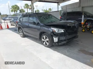 2020 Subaru Forester Touring with VIN JF2SKAXCXLH543386, listed as a IAAI auction lot 42444047 with 45,072 mi miles and . Bid and sale history available at DreamBid. Image 1.