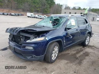 2014 Jeep Cherokee Latitude with VIN 1C4PJMCS0EW290714, listed as a IAAI auction lot 42013774 with 184,729 mi miles and . Bid and sale history available at carsss.com. Image 2.